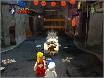 You will notice, that the gate to the garage is opening - Chapter 1 - Shanghai Showdown - The Temple of Doom - LEGO Indiana Jones: The Original Adventures - Game Guide and Walkthrough