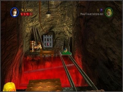 As Indy, jump above lava using whip - Chapter 4 - Free the Slaves - part 1 - The Temple of Doom - LEGO Indiana Jones: The Original Adventures - Game Guide and Walkthrough