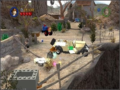 Go all the way to the right and you will reach a farm with broken car and tractors - Chapter 4 - Trouble in the Sky - The Last Crusade - LEGO Indiana Jones: The Original Adventures - Game Guide and Walkthrough