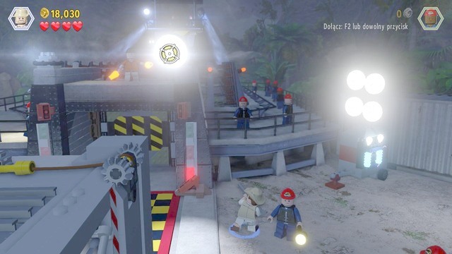 Switch to Robert and shoot the spotlights that you can see in the screenshot - Prologue - Jurassic Park - walkthrough - LEGO Jurassic World - Game Guide and Walkthrough