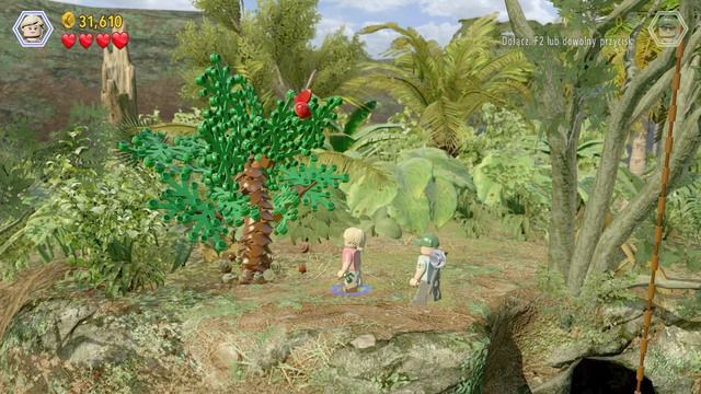 After you smash the green tree there, collect the blue items and follow the blue trail to the other side of the elevation - Welcome to Jurassic Park - Jurassic Park - walkthrough - LEGO Jurassic World - Game Guide and Walkthrough