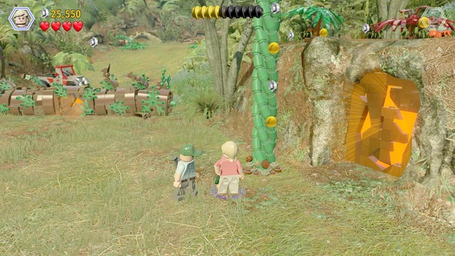 After you follow the blue line to the flower, switch to Ellie and water the plant - Welcome to Jurassic Park - Jurassic Park - walkthrough - LEGO Jurassic World - Game Guide and Walkthrough