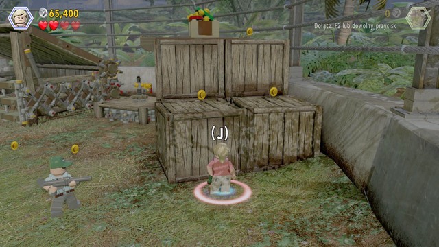 As Ellie, walk over to the right side, jump onto the boxes and move the crate on the very top - Welcome to Jurassic Park - Jurassic Park - walkthrough - LEGO Jurassic World - Game Guide and Walkthrough