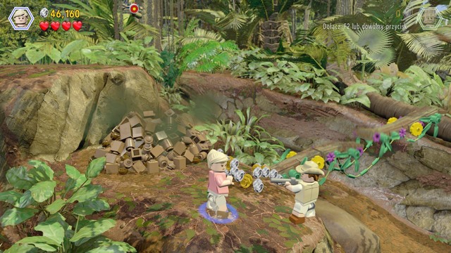 As Ellie, walk over to the left, where you find a heap of dirt - Restoring power - Jurassic Park - walkthrough - LEGO Jurassic World - Game Guide and Walkthrough