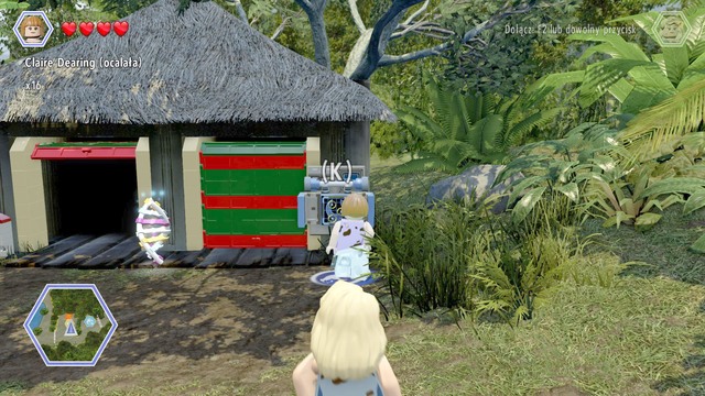 As Claire, walk to the gate on the right side and hack the control panel - Jurassic Park Gate - Jurassic Park - secrets in free roam - LEGO Jurassic World - Game Guide and Walkthrough