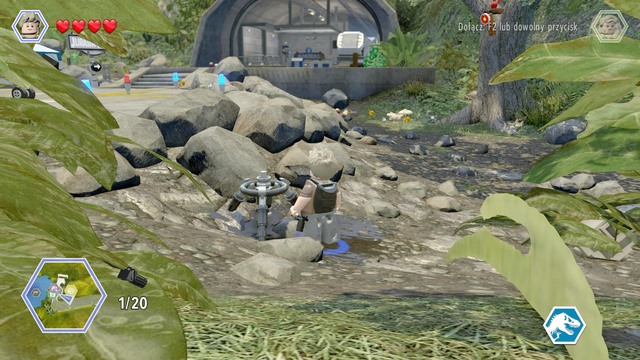 The tripod can be found next to the helicopter - Isla Nubar Helipad - Jurassic Park - secrets in free roam - LEGO Jurassic World - Game Guide and Walkthrough