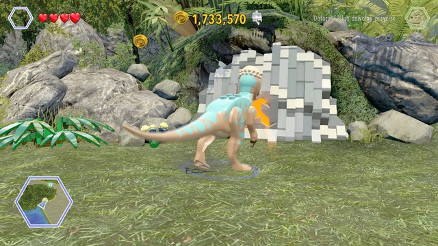 As pachycephalosaurus, destroy the blockade, then switch your character to Timmy and enter the darkened cave - Brachiosaurus Plains - Jurassic Park - secrets in free roam - LEGO Jurassic World - Game Guide and Walkthrough