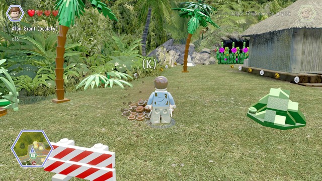 As Grant, walk to the pile of ground and dig up the bricks from it - Dilophosaurus Territory - Jurassic Park - secrets in free roam - LEGO Jurassic World - Game Guide and Walkthrough