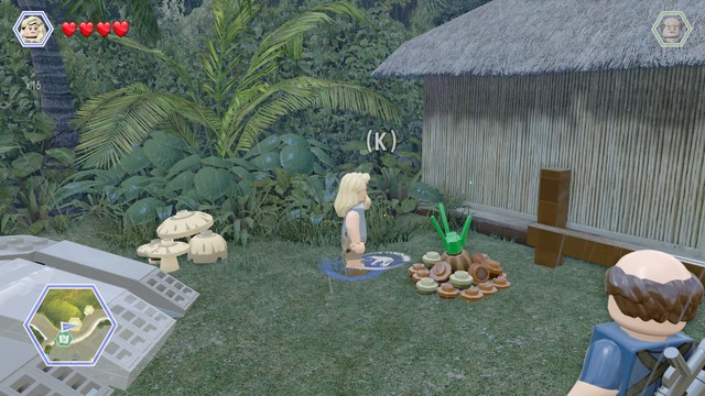 As Ellie, walk to the pile of ground shown on the picture and water it up - Carnivore Territory - Jurassic Park - secrets in free roam - LEGO Jurassic World - Game Guide and Walkthrough