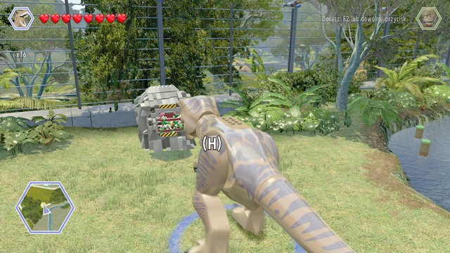 As tyrannosaurus, walk to the brick object shown on the picture and use your strength to destroy it - Triceratops Territory - Jurassic Park - secrets in free roam - LEGO Jurassic World - Game Guide and Walkthrough