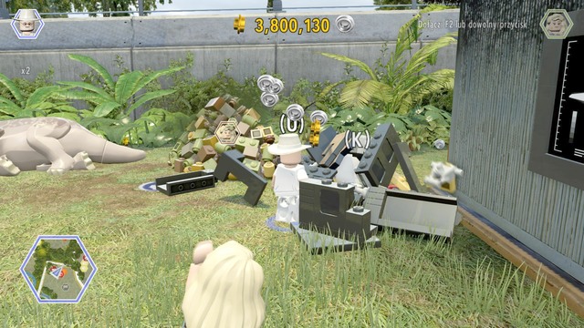 Walk to the containers next to the triceratops and destroy them - Triceratops Territory - Jurassic Park - secrets in free roam - LEGO Jurassic World - Game Guide and Walkthrough