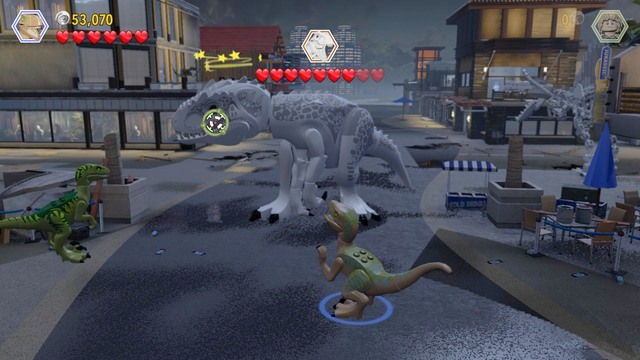 Use the scattered bricks to build the second part of the weapon and use it - Main Street Showdown - Jurassic World - walkthrough - LEGO Jurassic World - Game Guide and Walkthrough