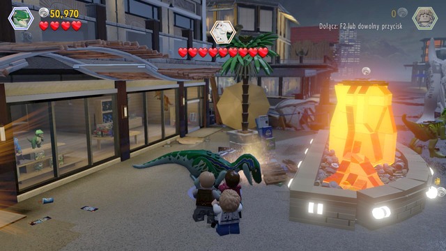As velociraptor, approach the triceratops figure and follow the scent - Main Street Showdown - Jurassic World - walkthrough - LEGO Jurassic World - Game Guide and Walkthrough