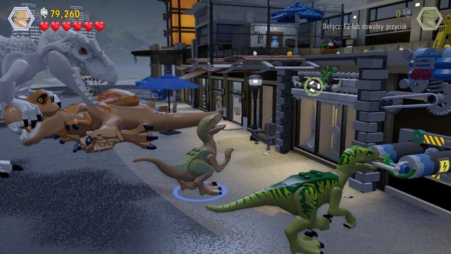 As velociraptor, approach the lever on the right and pull it to gain access to the other one - Main Street Showdown - Jurassic World - walkthrough - LEGO Jurassic World - Game Guide and Walkthrough