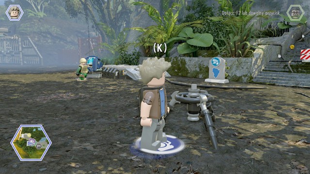 As Billy, walk to the tripod next to the building and make a picture - Shady Grove - Jurassic World - secrets in free roam - LEGO Jurassic World - Game Guide and Walkthrough