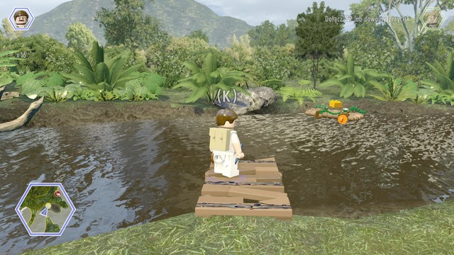 As Paul, walk on the platform and aim at the raft on which the golden brick can be seen - Gyrosphere Valley - Jurassic World - secrets in free roam - LEGO Jurassic World - Game Guide and Walkthrough