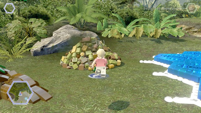 Walk to the dinosaur excrements and check which items are needed to heal him - Gyrosphere Valley - Jurassic World - secrets in free roam - LEGO Jurassic World - Game Guide and Walkthrough