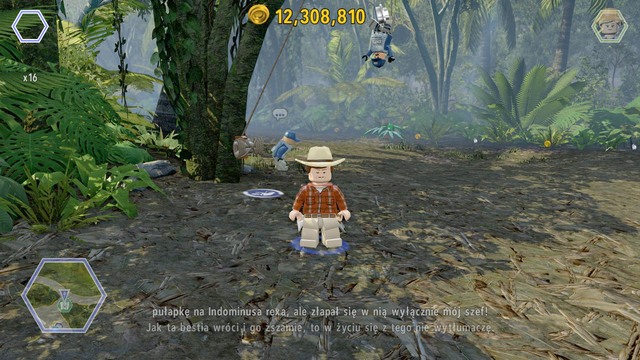 As Grant, approach the rope hanged on the tree and cut it in order to save the worker in peril - Indominus Territory - Jurassic World - secrets in free roam - LEGO Jurassic World - Game Guide and Walkthrough