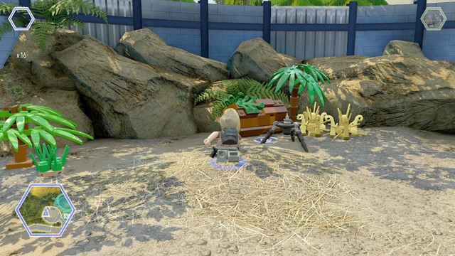 Walk to the tripod shown on the picture as Billy and take a photo of the small triceratops - East Boardwalk - Jurassic World - secrets in free roam - LEGO Jurassic World - Game Guide and Walkthrough