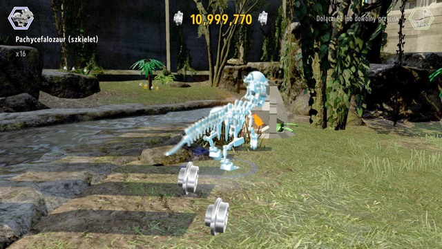 As pachycephalosaurus, destroy the rocks shown on the picture to receive the sixth golden brick - West Boardwalk - Jurassic World - secrets in free roam - LEGO Jurassic World - Game Guide and Walkthrough