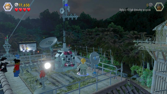 While on the roof, smash the antenna with the red object and use it as a lever, to lower the main antenna - Communications Center - Jurassic Park - The Lost World - walkthrough - LEGO Jurassic World - Game Guide and Walkthrough