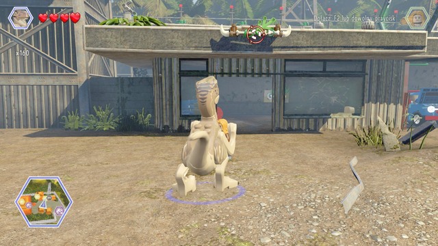 As raptor, jump on the road - Communications Center - Jurassic Park - The Lost World - secrets in free roam - LEGO Jurassic World - Game Guide and Walkthrough