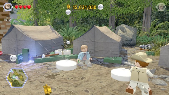 Walk to the fire and destroy all the green InGen containers - Hunter Camp - Jurassic Park - The Lost World - secrets in free roam - LEGO Jurassic World - Game Guide and Walkthrough