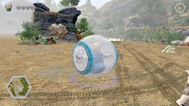 Use the gyrosphere to ride on the jump and destroy the rock shown on the picture - Hunting Plains - Jurassic Park - The Lost World - secrets in free roam - LEGO Jurassic World - Game Guide and Walkthrough