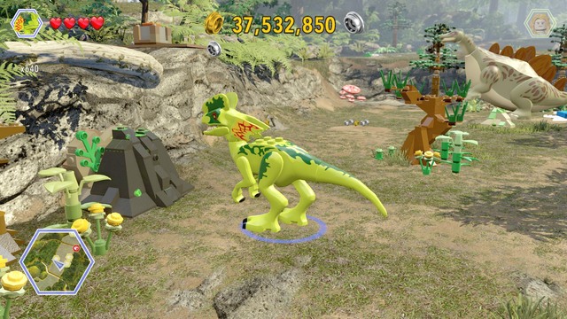 As dilophosaurus, walk to the right side and destroy the black brick that blocks the access to the passage - Stegosaurus Territory - Jurassic Park - The Lost World - secrets in free roam - LEGO Jurassic World - Game Guide and Walkthrough
