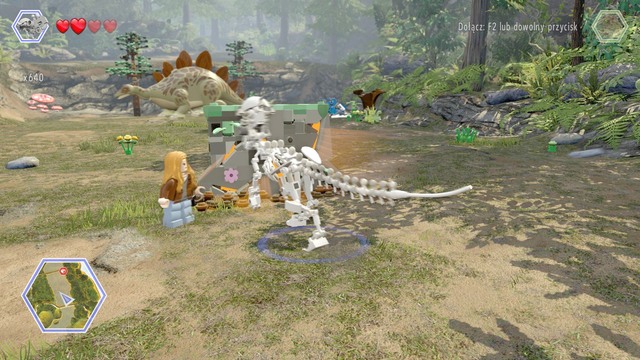 In stegosaurus stall, walk to the wall shown on the picture and, as pachycephalosaurus, destroy it - Stegosaurus Territory - Jurassic Park - The Lost World - secrets in free roam - LEGO Jurassic World - Game Guide and Walkthrough