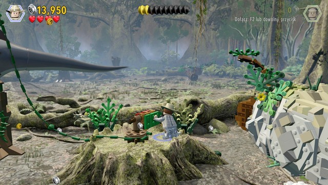 After the battle with the spinosaurus, cut to Paul and pull bricks from the tree trunk, using the rope - Spinosaurus - Jurassic Park III - walkthrough - LEGO Jurassic World - Game Guide and Walkthrough