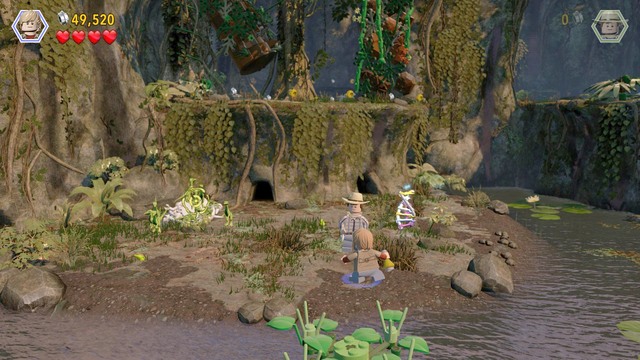 Jump over the water, switch to Eric and throw the tyrannosaur scent towards the dinosaurs to drive them away - Eric Kirby - Jurassic Park III - walkthrough - LEGO Jurassic World - Game Guide and Walkthrough