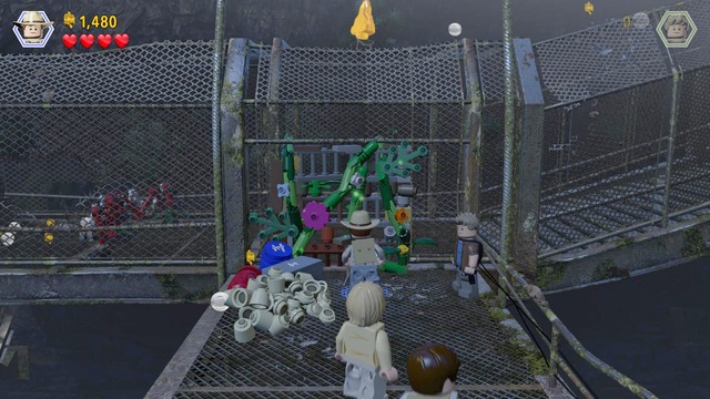 After you walk inside, as Grant, approach the plants in the way and cut them down - Birdcage - Jurassic Park III - walkthrough - LEGO Jurassic World - Game Guide and Walkthrough