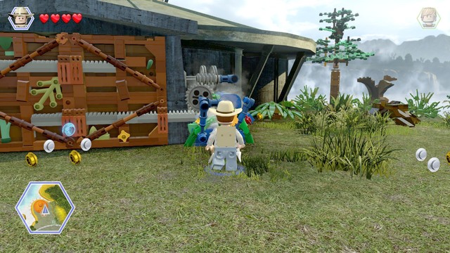 Make it over to the main gate and, as Grant, cut down the plants blocking the way to the mechanism - Birdcage - Jurassic Park III - walkthrough - LEGO Jurassic World - Game Guide and Walkthrough