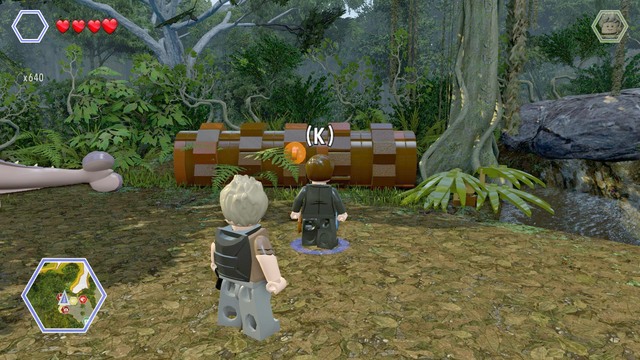 Second item can be found behind the brick trunk - Ankylosaurus Territory - Jurassic Park III - secrets in free roam - LEGO Jurassic World - Game Guide and Walkthrough