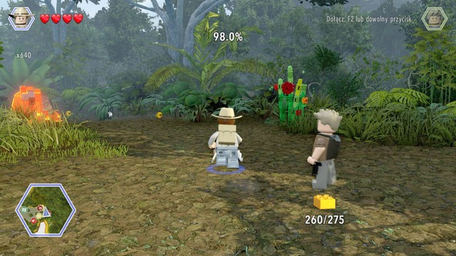 As Grant, walk to the grass shown on the picture and destroy it - Ankylosaurus Territory - Jurassic Park III - secrets in free roam - LEGO Jurassic World - Game Guide and Walkthrough