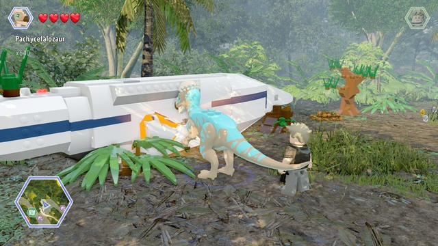 You will receive the second golden brick once you gain access to the wreck shown on the picture - Crash Site - Jurassic Park III - secrets in free roam - LEGO Jurassic World - Game Guide and Walkthrough