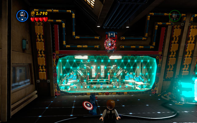 After the beginning of the mission toss Captain America's shield at the patriotic panel located above - Rebooted, Resuited - Walkthrough - LEGO Marvel Super Heroes - Game Guide and Walkthrough