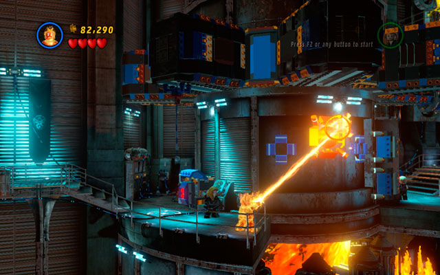 Melt the ball using Human Torch's fire beam, then switch back to Hawkeye and shoot an arrow at the uncovered gap - Red Head Detention - Walkthrough - LEGO Marvel Super Heroes - Game Guide and Walkthrough