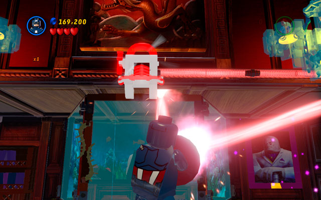 Rotate yourself to direct the laser beam on the red generator placed above the aquarium (with Kingpin hidden inside) - Feeling Fisky - Deadpool Bonus Missions: Walkthrough - LEGO Marvel Super Heroes - Game Guide and Walkthrough