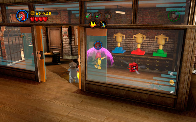 In order to find Deadpool brick, enter the office with Deadpool hidden inside and use Jeans telekinesis power to put nearby chalices in to the right places (the color of basis should be the same as on chalice) - Tabloid Tidy Up - Deadpool Bonus Missions: Collectables - LEGO Marvel Super Heroes - Game Guide and Walkthrough