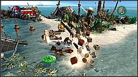 In the morning go to the beach, destroy the golden wheel standing in water and rebuild it - Smuggler's Den - walkthrough - The Curse of the Black Pearl - LEGO Pirates of the Caribbean: The Video Game - Game Guide and Walkthrough