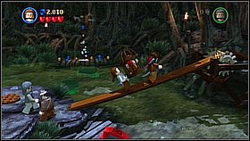 Use the pieces of the alligator to get on the island [1] Take the cage and walk the narrow plank - A Touch of Destiny - walkthrough - Dead Man's Chest - LEGO Pirates of the Caribbean: The Video Game - Game Guide and Walkthrough