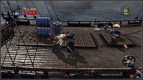 The first thing you need to do is to throw few objects to the bucket standing in the middle of the deck - Maelstrom - walkthrough - At World's End - LEGO Pirates of the Caribbean: The Video Game - Game Guide and Walkthrough