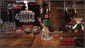 The pirate wearing the green beret will repair the machine near the cage with explosives - Queen Annes Revenge - walkthrough - On Stranger Tides - LEGO Pirates of the Caribbean: The Video Game - Game Guide and Walkthrough