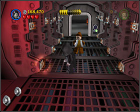 Use the Force on the switch shown on the screen in the corridor where you meet the droids in Story Mode - Secret Plans - Freeplay Mode - Episode IV - LEGO Star Wars II: The Original Trilogy - Game Guide and Walkthrough