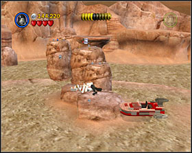 In the last area of the level you'll see a minikit on the rock in the middle of the swamp - Through the Jundland Wastes - Freeplay Mode - Episode IV - LEGO Star Wars II: The Original Trilogy - Game Guide and Walkthrough