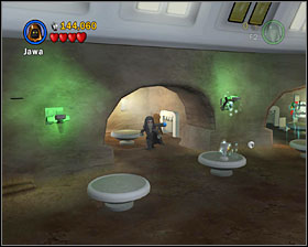 In the Cantina use the tunnel shown on the screenshot - Mos Eisley Spaceport - Freeplay Mode - Episode IV - LEGO Star Wars II: The Original Trilogy - Game Guide and Walkthrough