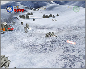 In the first section use the tow cable to bring down 10 AT-STs - Hoth Battle - Freeplay Mode - Episode V - LEGO Star Wars II: The Original Trilogy - Game Guide and Walkthrough