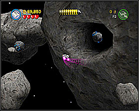 At the beginning of the last section, on the right - shoot the blue spot in the crater - Falcon Flight - Freeplay Mode - Episode V - LEGO Star Wars II: The Original Trilogy - Game Guide and Walkthrough